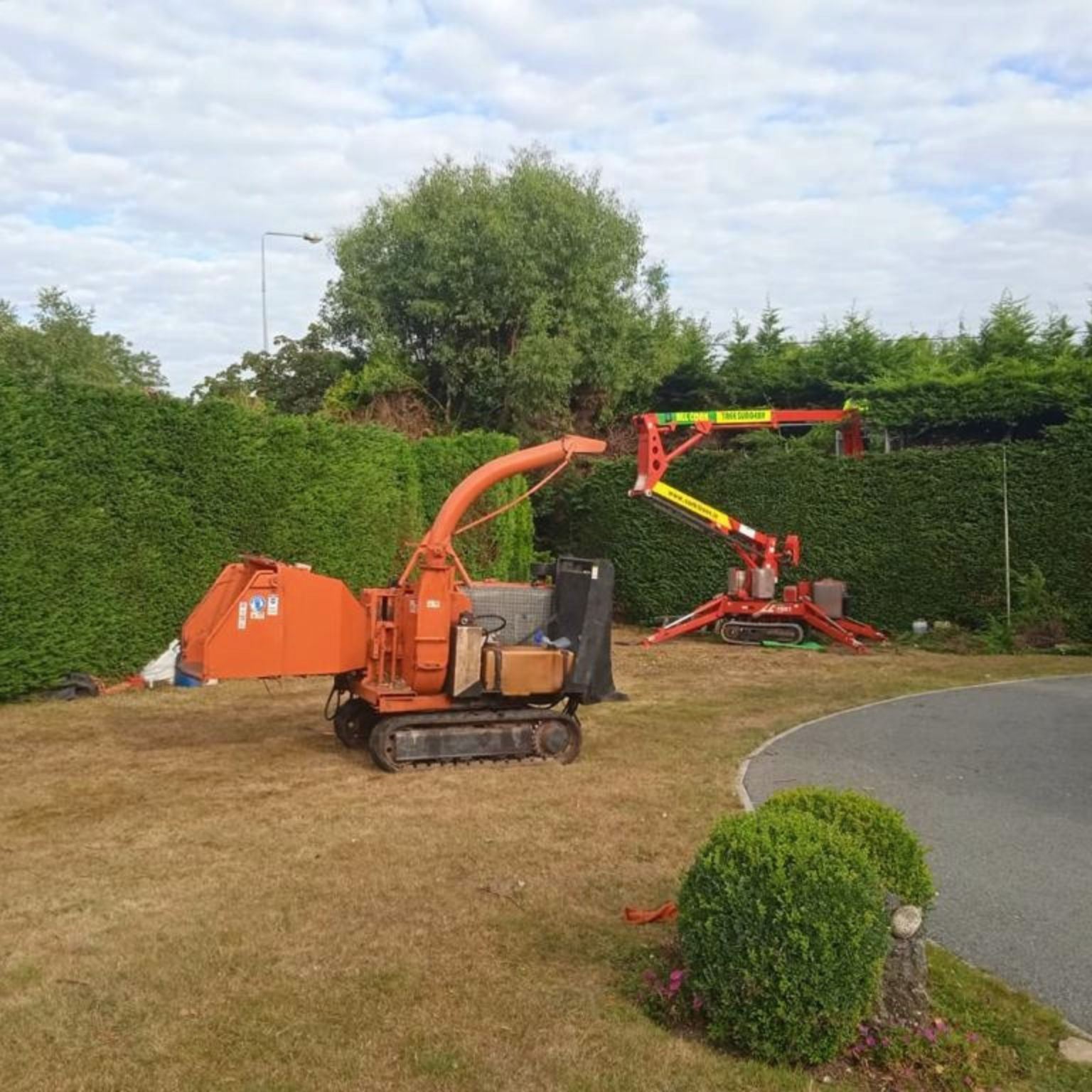 Hedge trimming equipment in the middle of a project.